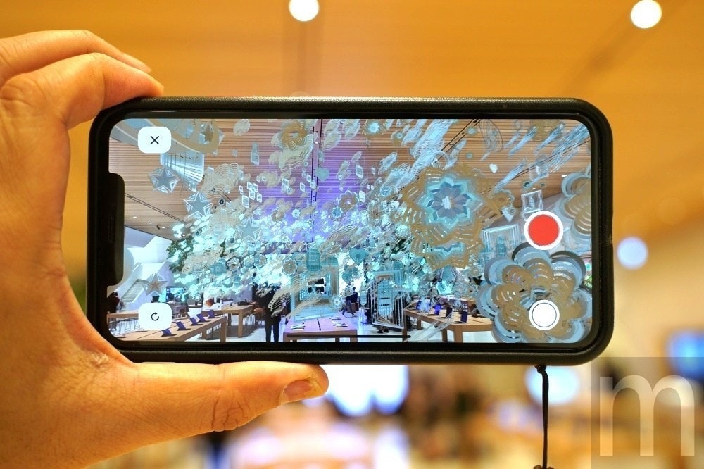 照片中跟iPhone X有关，包含了ar扩增实实境、增强现实、苹果、苹果、苹果手机