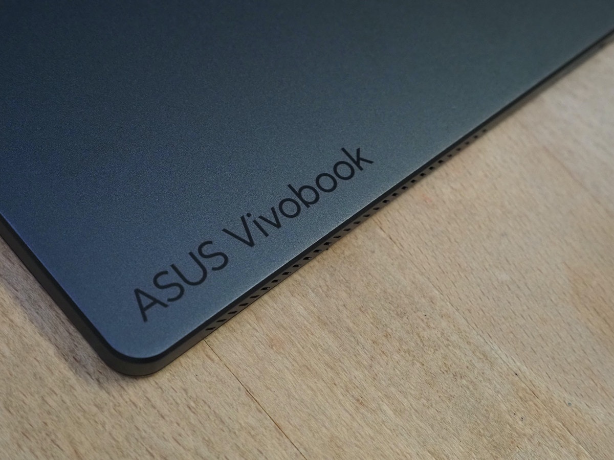 照片中提到了ASUS Vivobook，包含了材料、产品设计、产品、设计、字形