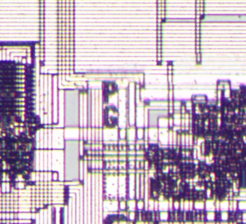 A closeup of the 386 die showing the initials PG.